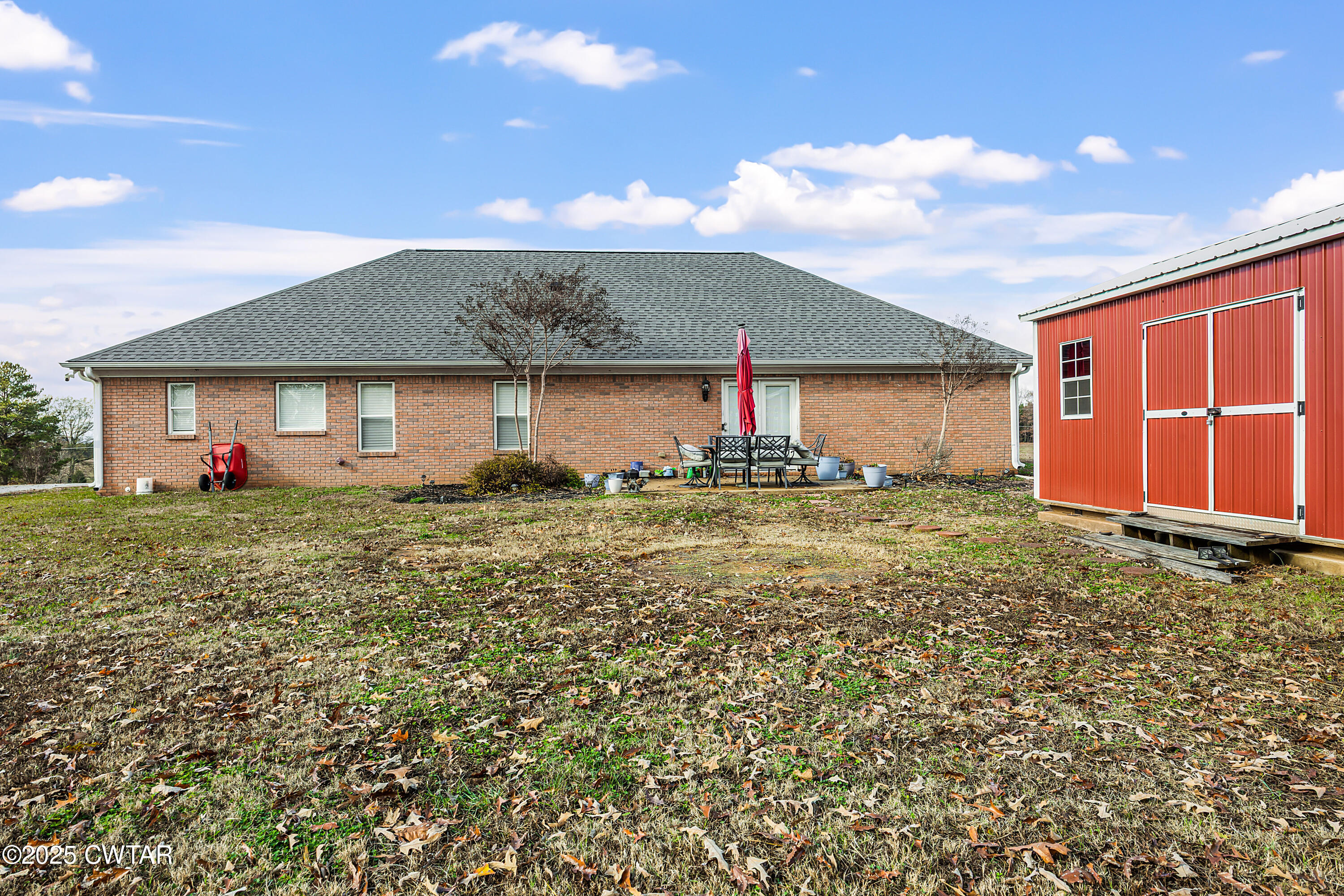 18232 Highway 79 Gadsden, TN 38337 - Photo 17 of 22 a front view of house with a garden