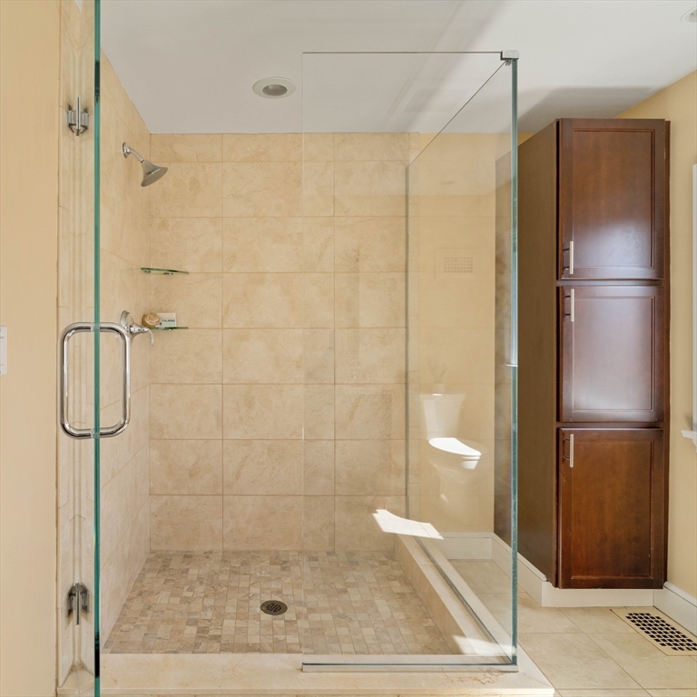 8 Littlefield Road Newton, MA 02459 - Photo 15 of 33 a bathroom with a shower
