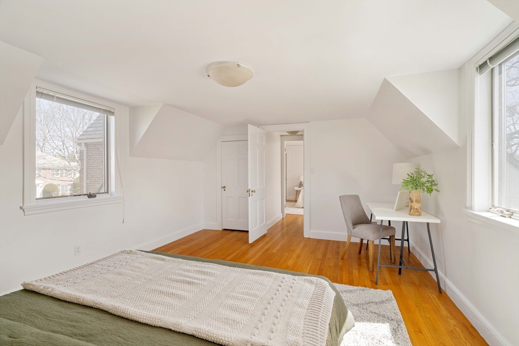 8 Littlefield Road Newton, MA 02459 - Photo 22 of 33 a bed room with a bed and a chair