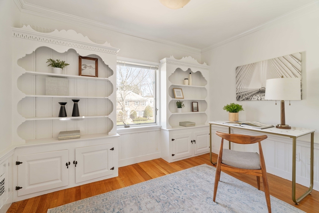 8 Littlefield Road Newton, MA 02459 - Photo 26 of 33 a bedroom with a bed and a cabinets