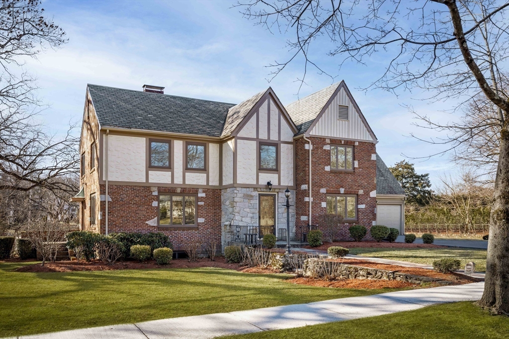 8 Littlefield Road Newton, MA 02459 - Photo 30 of 33 a front view of a house with a yard