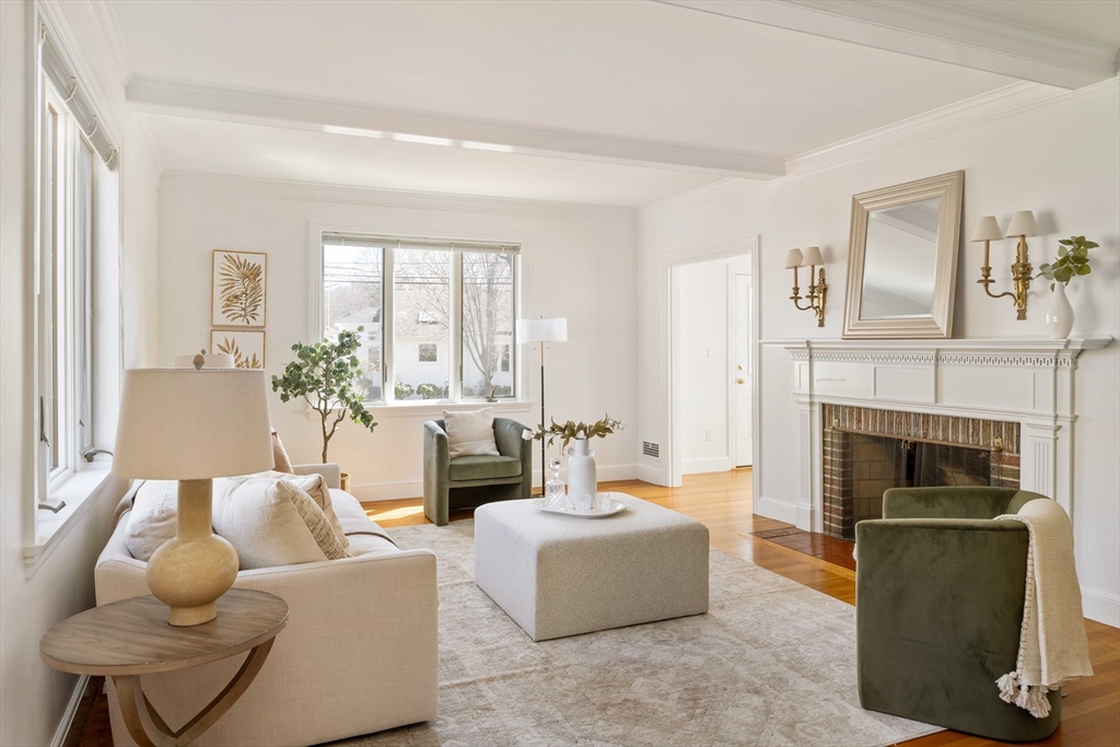 8 Littlefield Road Newton, MA 02459 - Photo 3 of 33 a living room with furniture and a fireplace