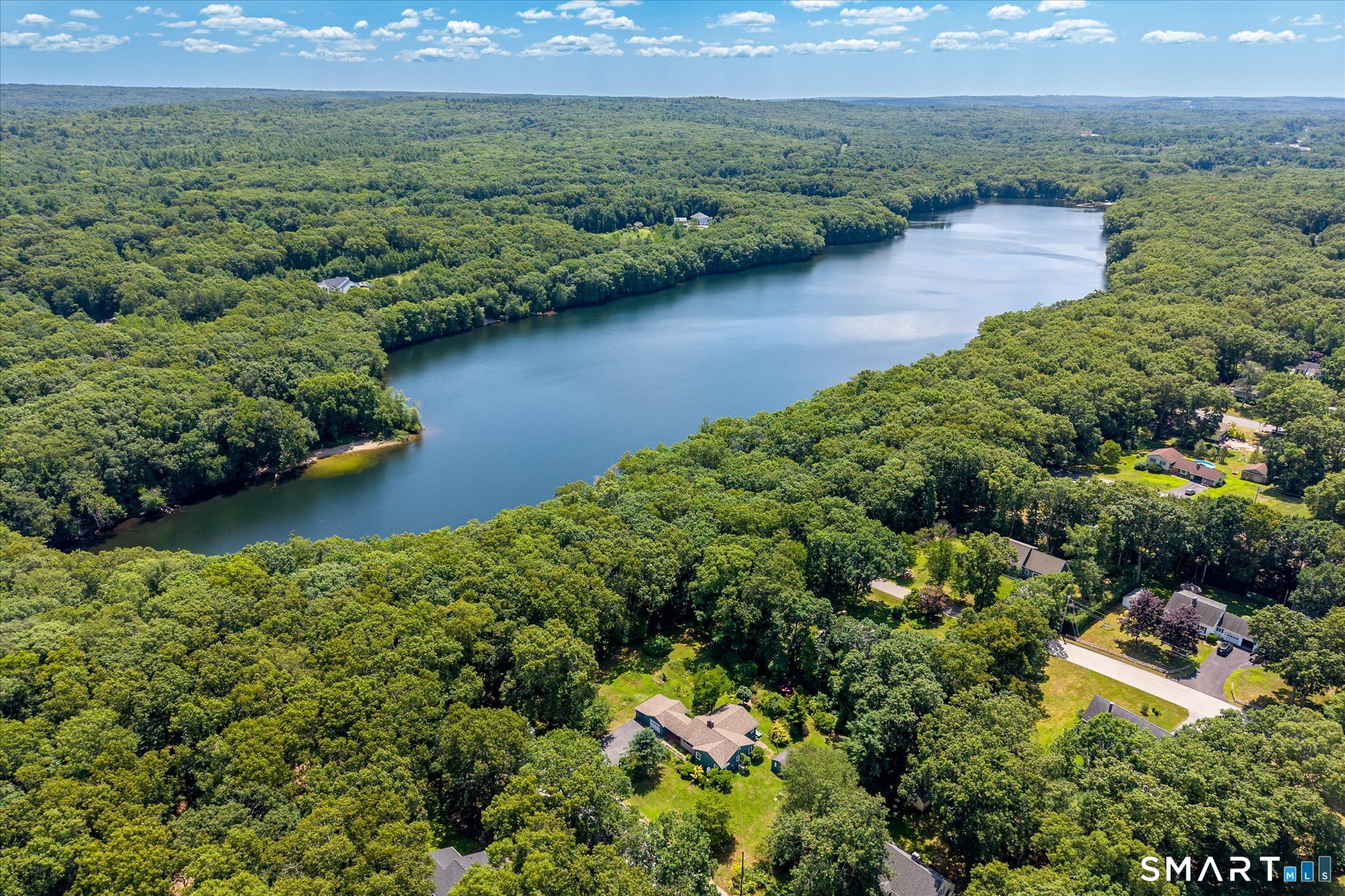 19 Beckwith Street Killingly, CT 06239 - Photo 3 of 39 an aerial view of a house with a yard and lake view