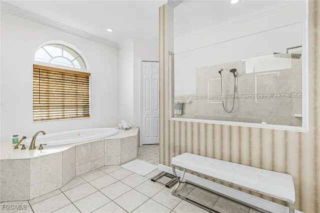 a bathroom with a bathtub and a sink