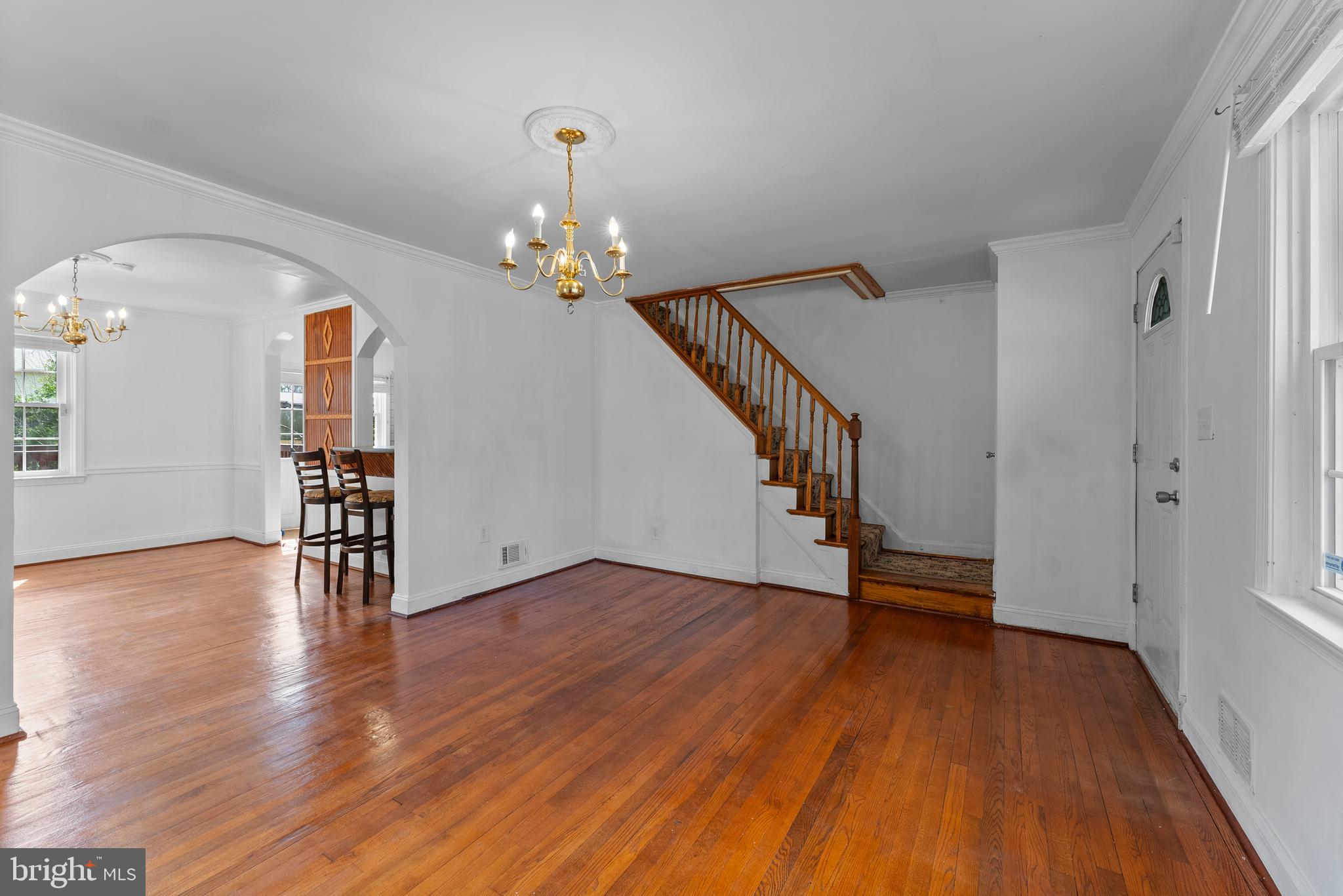 633 Walker Avenue Baltimore, MD 21212 - Photo 18 of 32 a view of empty room with wooden floor