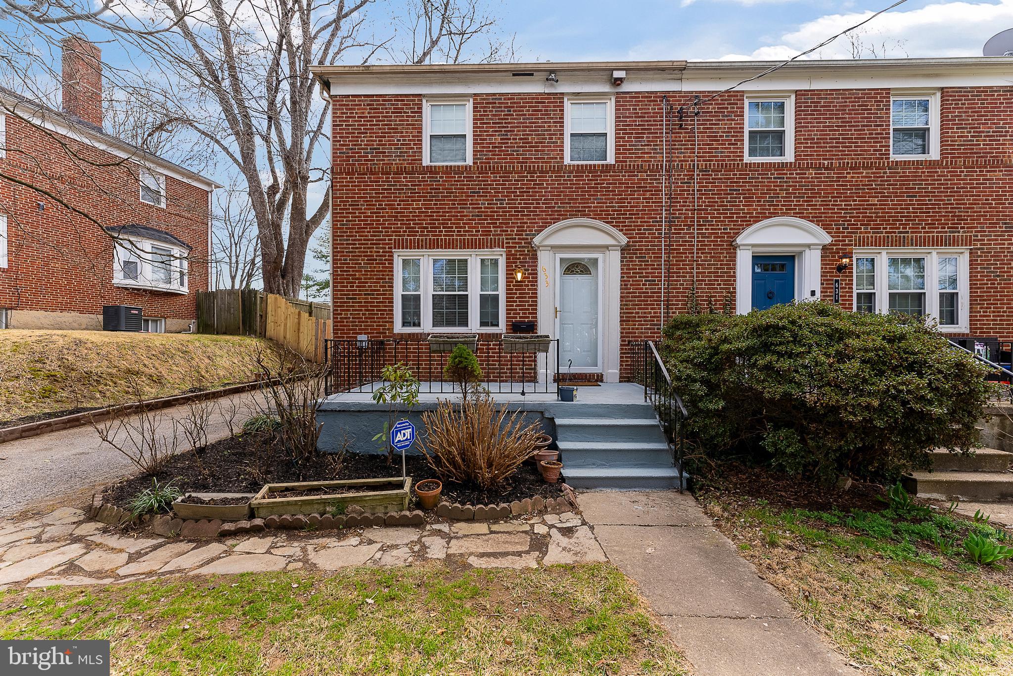 633 Walker Avenue Baltimore, MD 21212 - Photo 8 of 32 a front view of a house with a yard