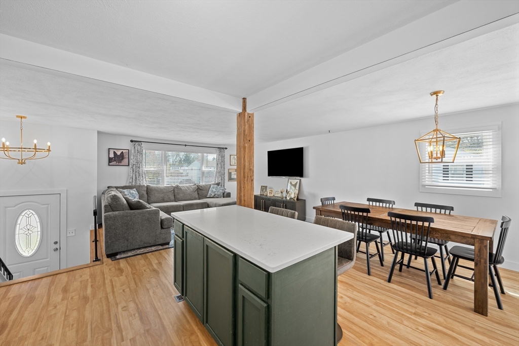 3 Lark Drive Hudson, MA 01749 - Photo 12 of 38 a view of a dining room with furniture and window