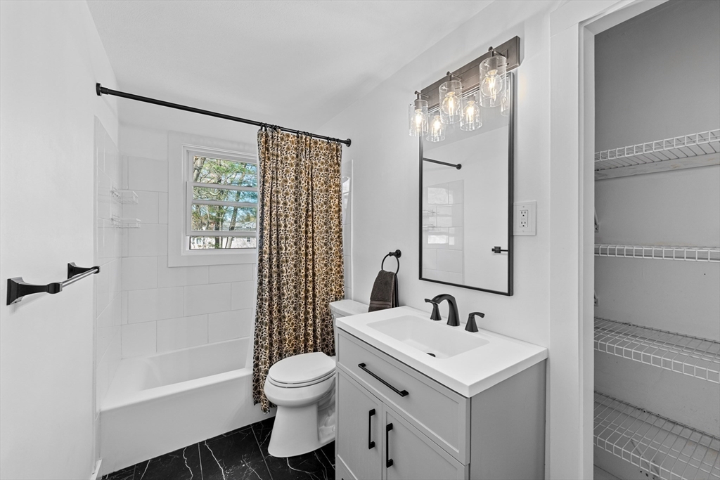 3 Lark Drive Hudson, MA 01749 - Photo 14 of 38 a bathroom with a sink toilet and shower
