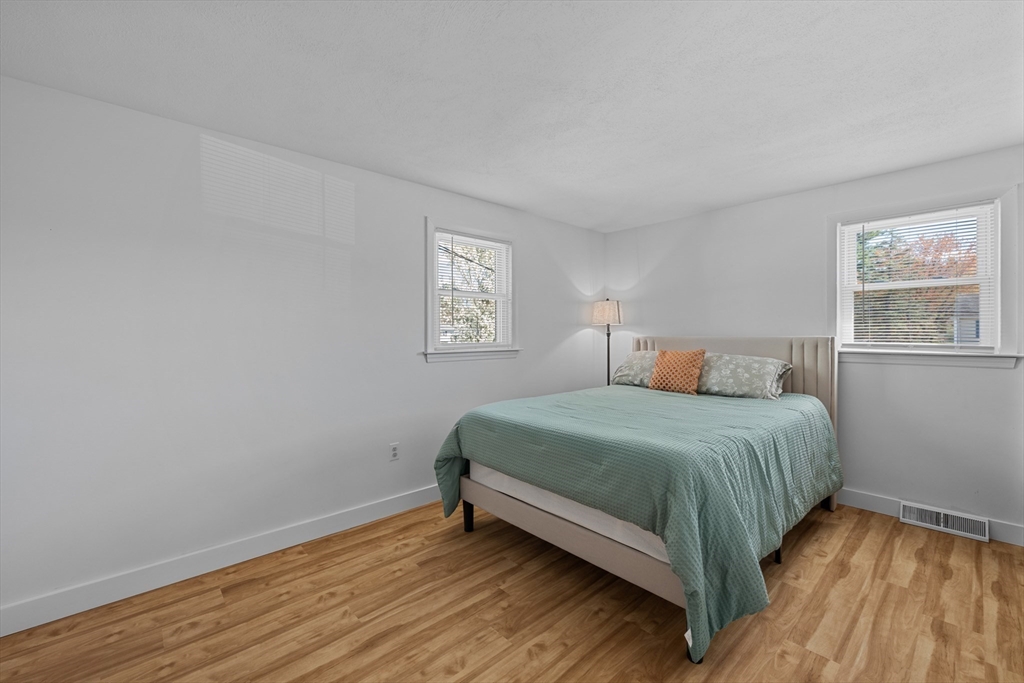 3 Lark Drive Hudson, MA 01749 - Photo 17 of 38 a bedroom with a bed and a window