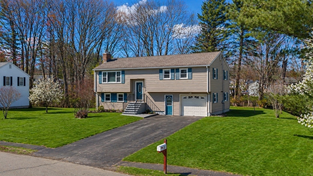 3 Lark Drive Hudson, MA 01749 - Photo 2 of 38 a house view with a garden space