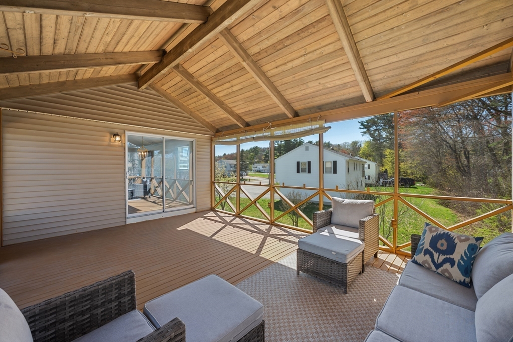 3 Lark Drive Hudson, MA 01749 - Photo 29 of 38 a view of a patio with a table and chairs