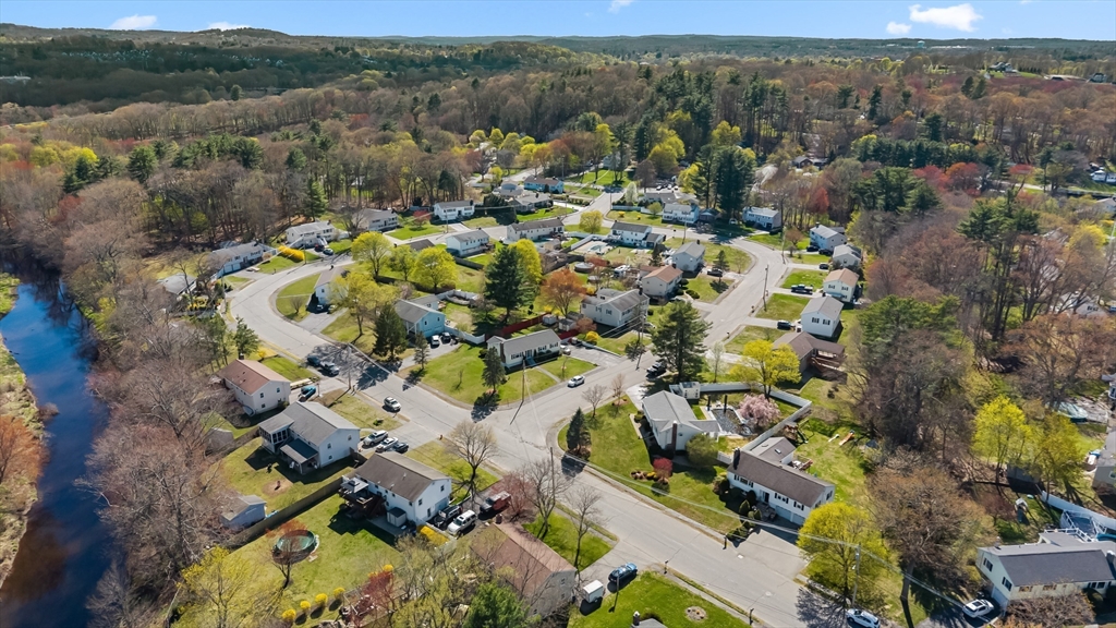 3 Lark Drive Hudson, MA 01749 - Photo 37 of 38 an aerial view of a houses with a lush green hillside