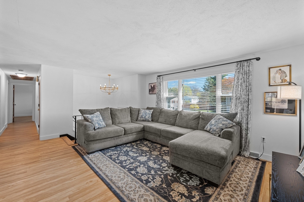3 Lark Drive Hudson, MA 01749 - Photo 5 of 38 a living room with furniture and a large window