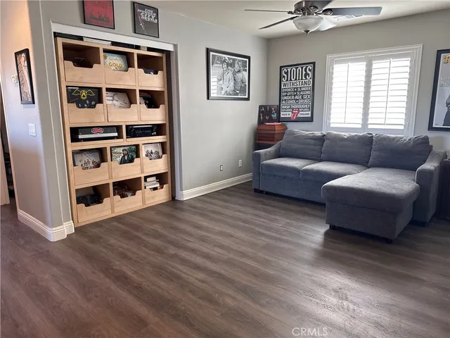 a living room with furniture and decor