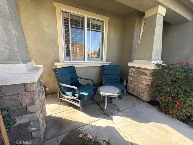 a view of mountain with sunset in background