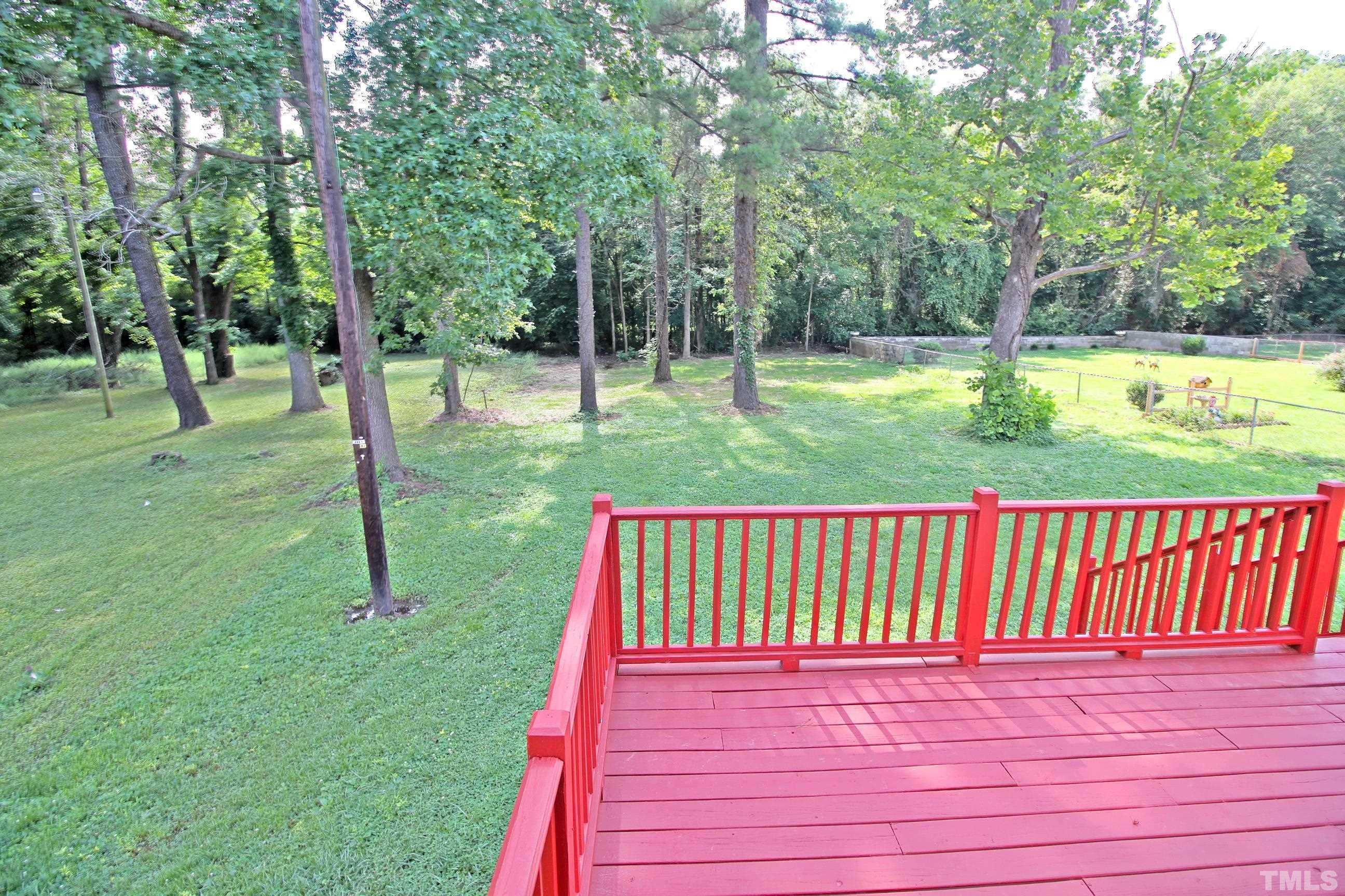 548 Dacian Road Raleigh, NC 27610 - Photo 15 of 16 a view of a park with a slide