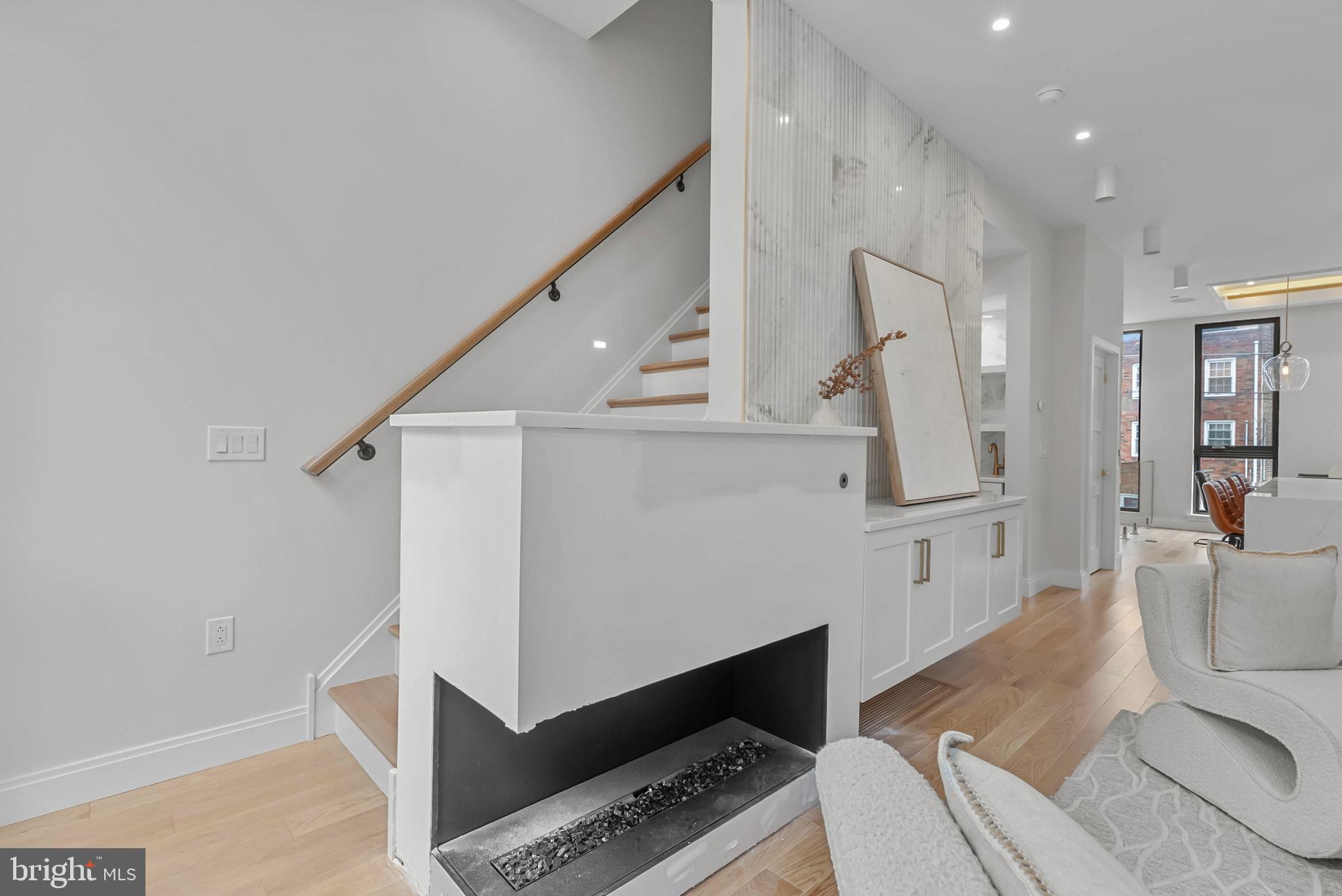 1100 Webster Street, Unit 4 Philadelphia, PA 19147 - Photo 18 of 53 a living room with furniture and a table
