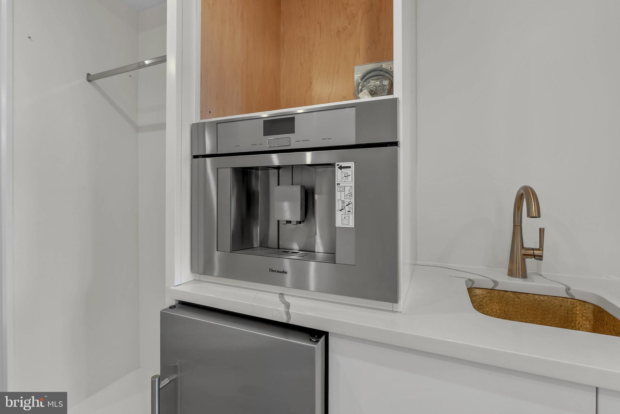 1100 Webster Street, Unit 4 Philadelphia, PA 19147 - Photo 28 of 53 a bathroom with a sink and a mirror
