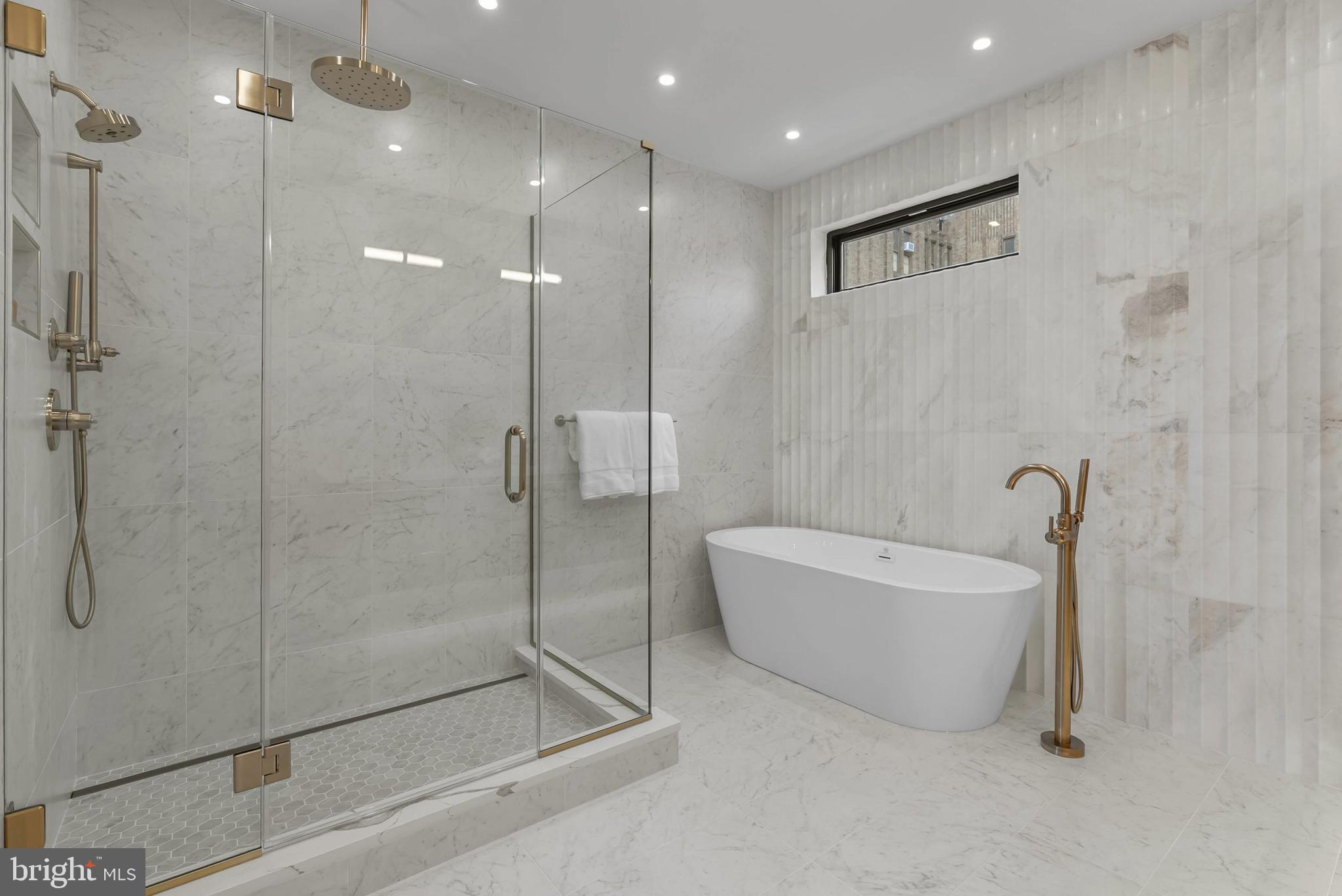 1100 Webster Street, Unit 4 Philadelphia, PA 19147 - Photo 29 of 53 a bathroom with a bathtub and a shower