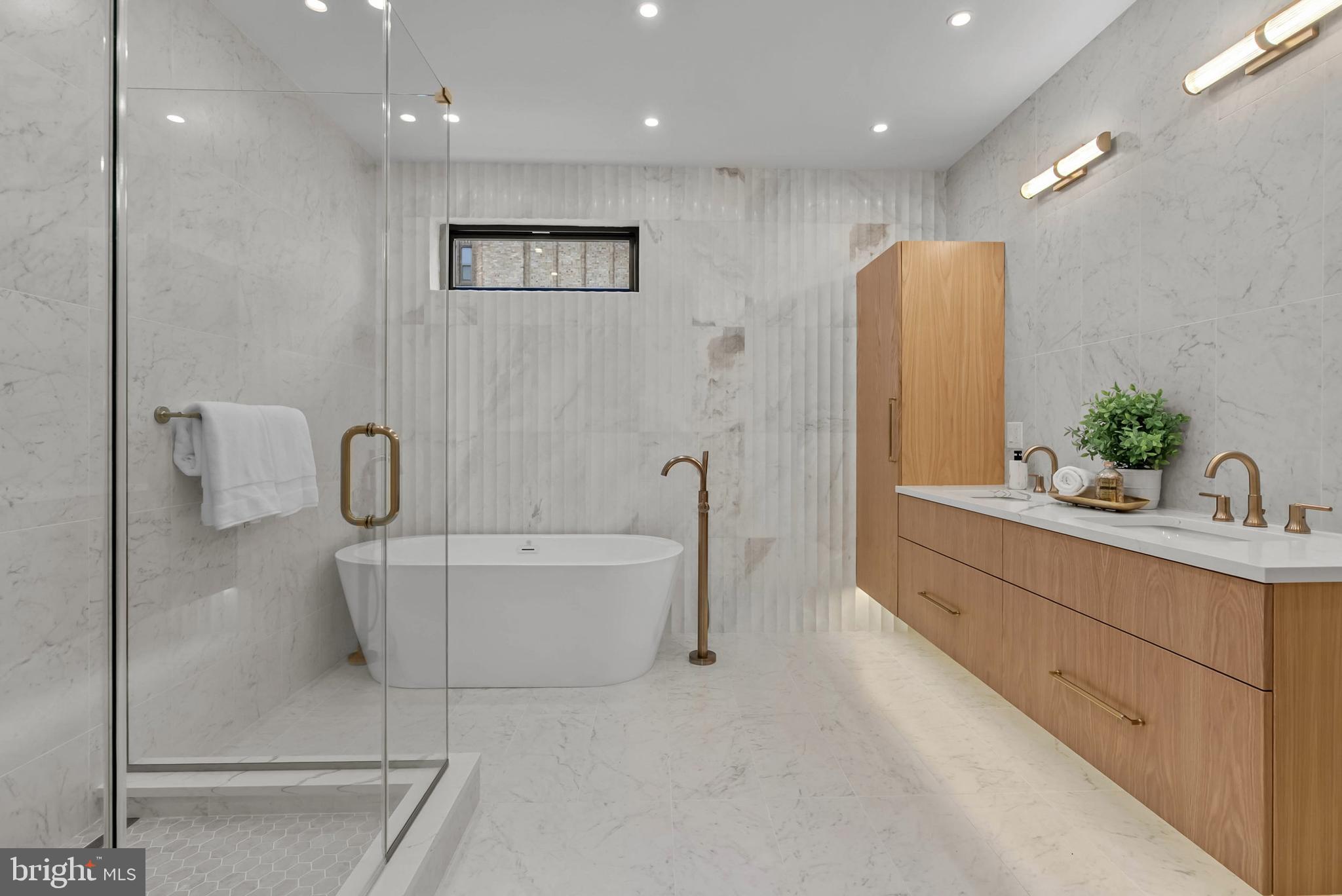 1100 Webster Street, Unit 4 Philadelphia, PA 19147 - Photo 30 of 53 a bathroom with a bathtub and a sink