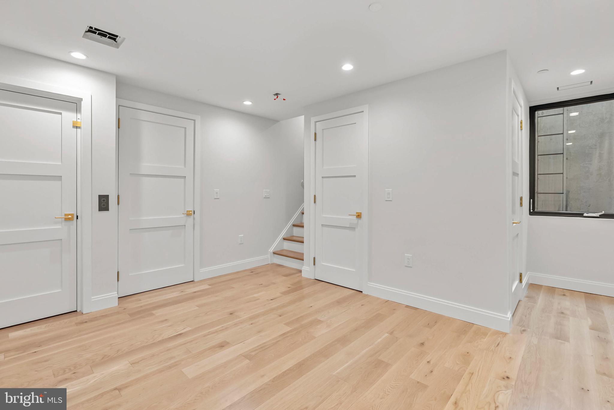 1100 Webster Street, Unit 4 Philadelphia, PA 19147 - Photo 48 of 53 wooden floor in an empty room with a window