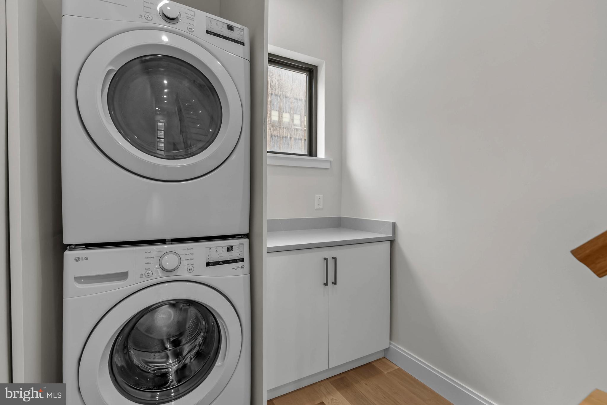 1100 Webster Street, Unit 4 Philadelphia, PA 19147 - Photo 51 of 53 a view of a hallway with washer and dryer