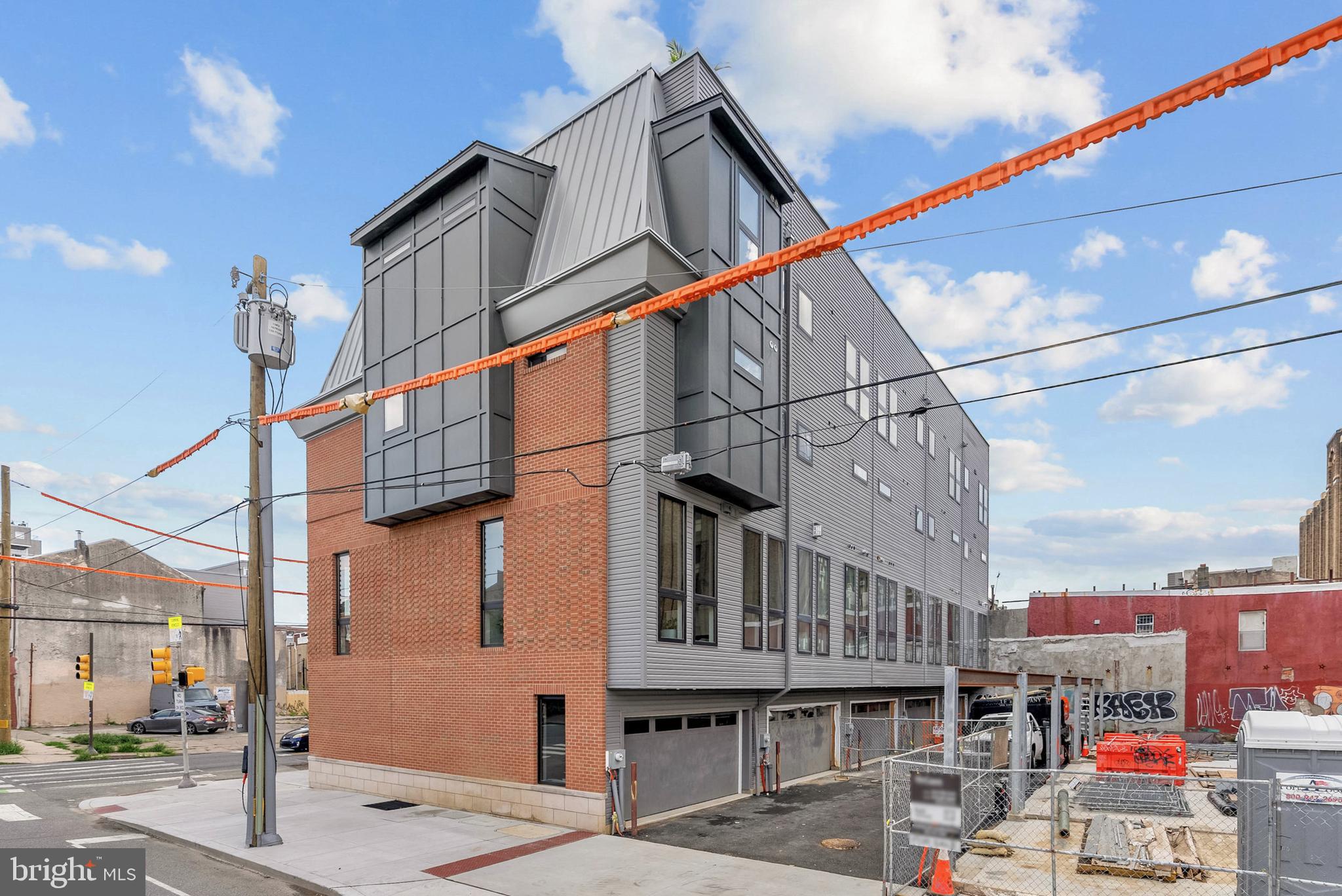 1100 Webster Street, Unit 4 Philadelphia, PA 19147 - Photo 52 of 53 a street view and tall buildings