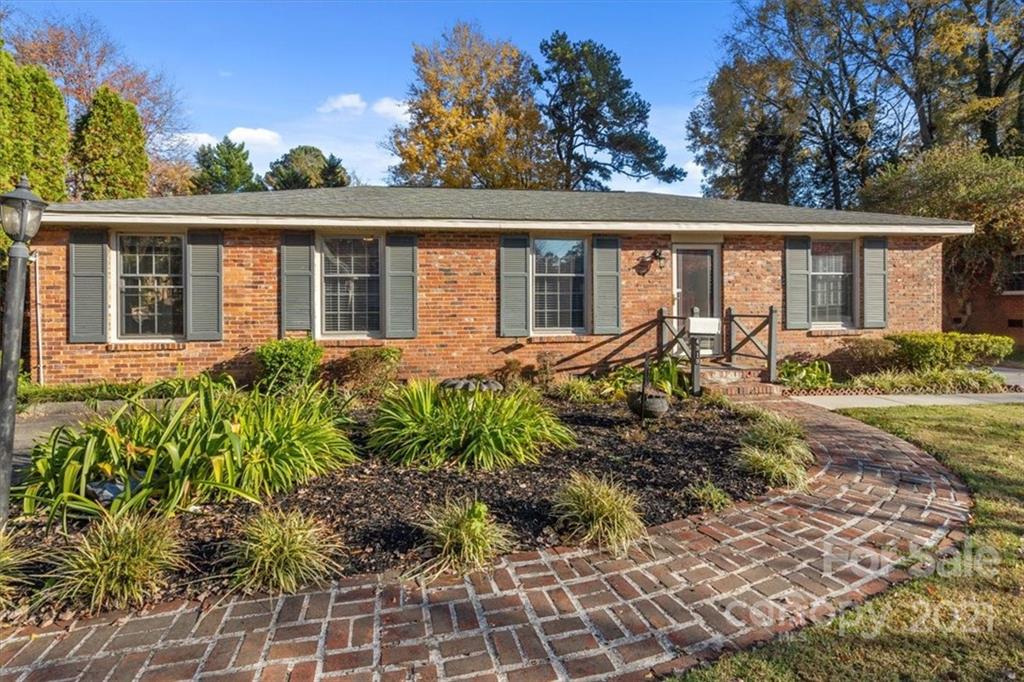 4919 Seacroft Road Charlotte, NC 28210 - Photo 3 of 25 a front view of a house with garden