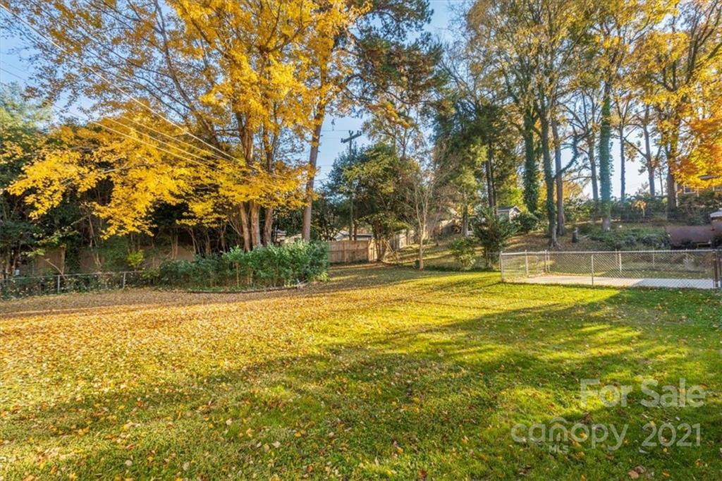 4919 Seacroft Road Charlotte, NC 28210 - Photo 21 of 25 a view of swimming pool with an outdoor space