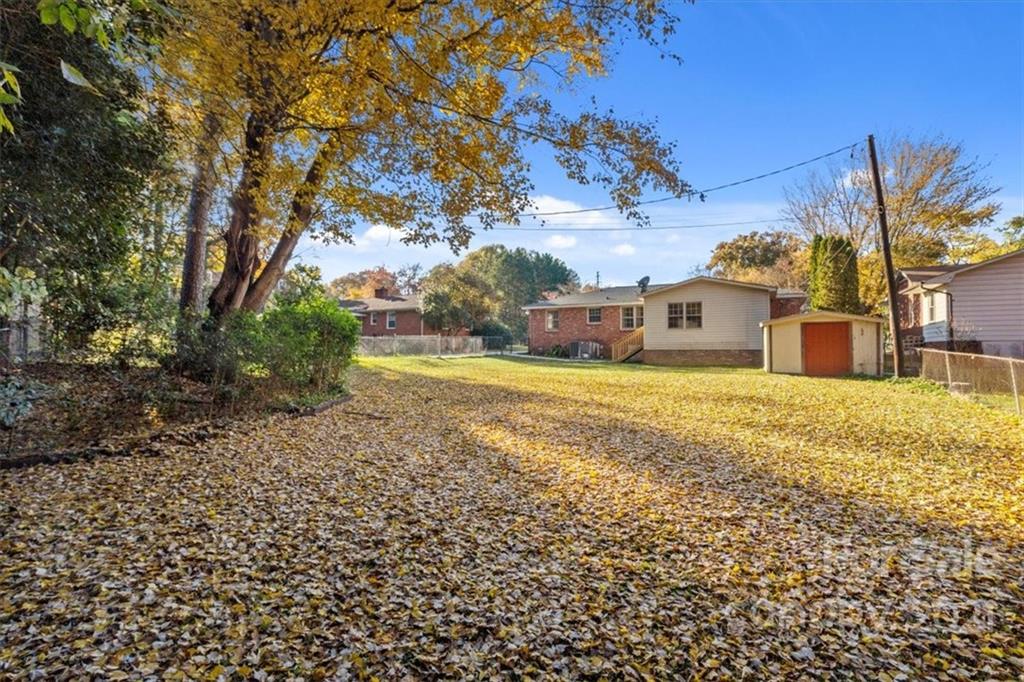 4919 Seacroft Road Charlotte, NC 28210 - Photo 23 of 25 a view of a house with a yard