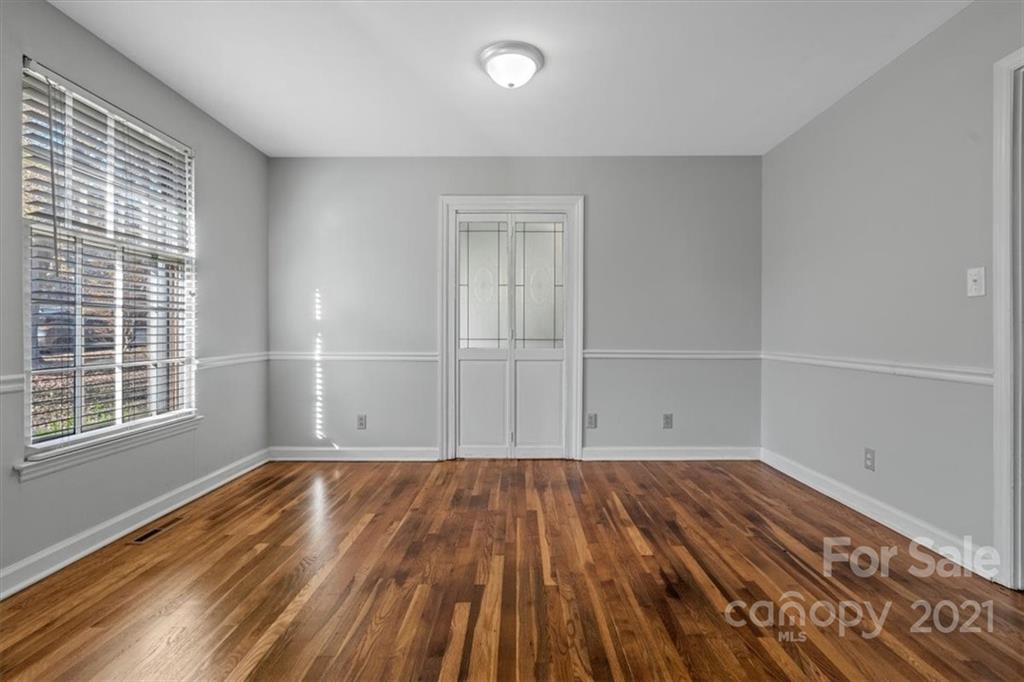 4919 Seacroft Road Charlotte, NC 28210 - Photo 7 of 25 a view of a room with wooden floor and window