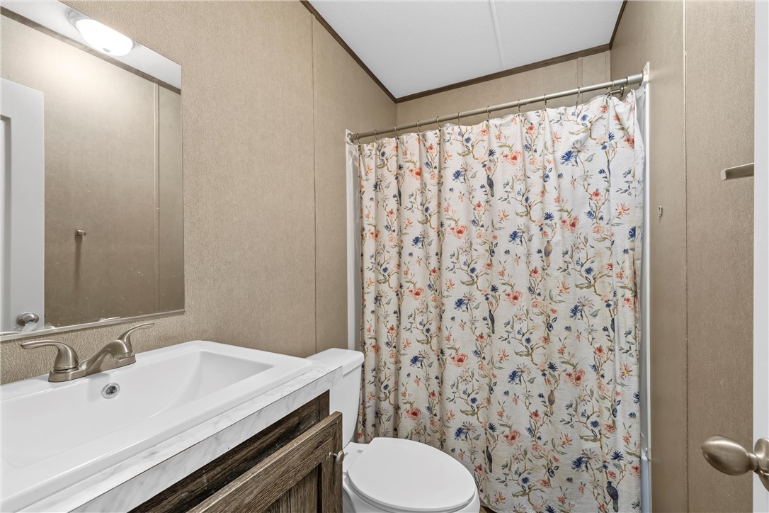 5481 Tokio Road West, TX 76691 - Photo 14 of 23 a bathroom with a sink and a mirror