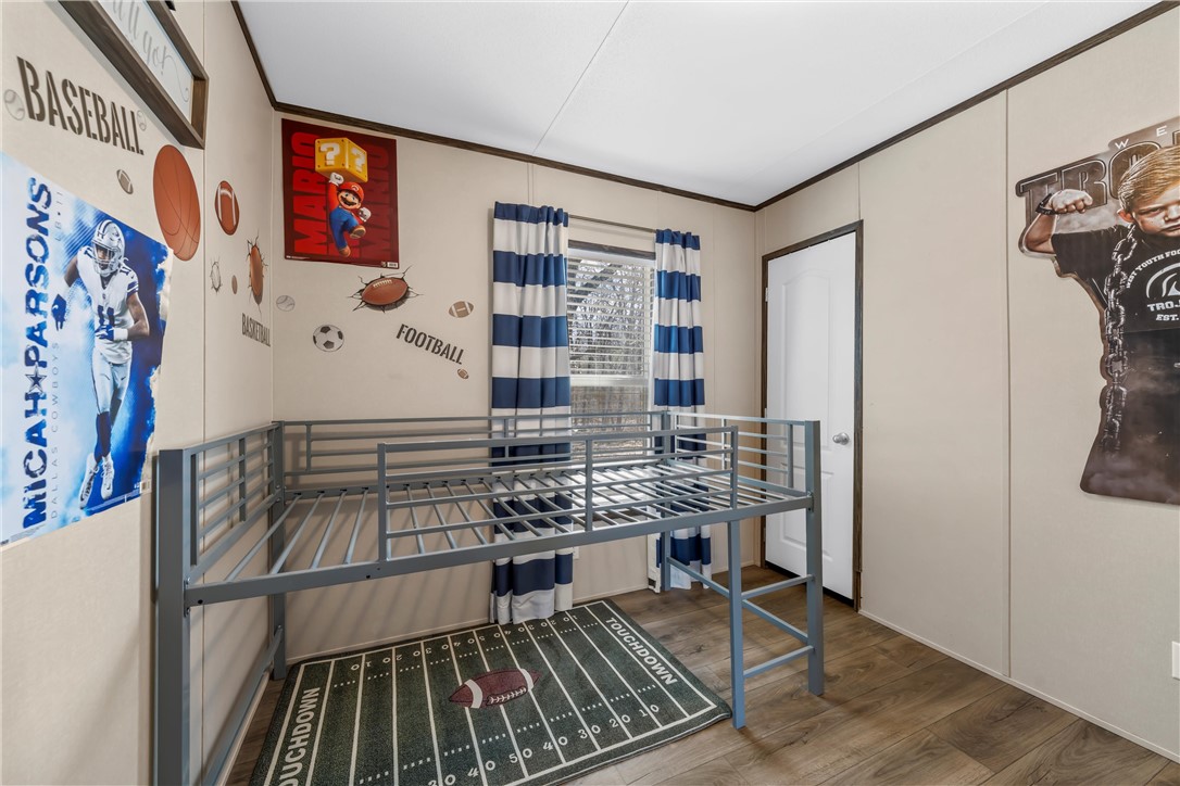 5481 Tokio Road West, TX 76691 - Photo 15 of 23 a kitchen with stainless steel appliances a stove and a refrigerator