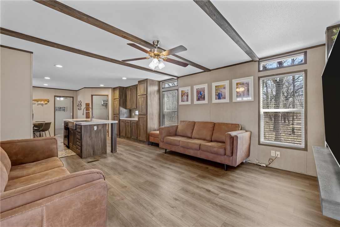 5481 Tokio Road West, TX 76691 - Photo 8 of 23 a living room with furniture and a large window