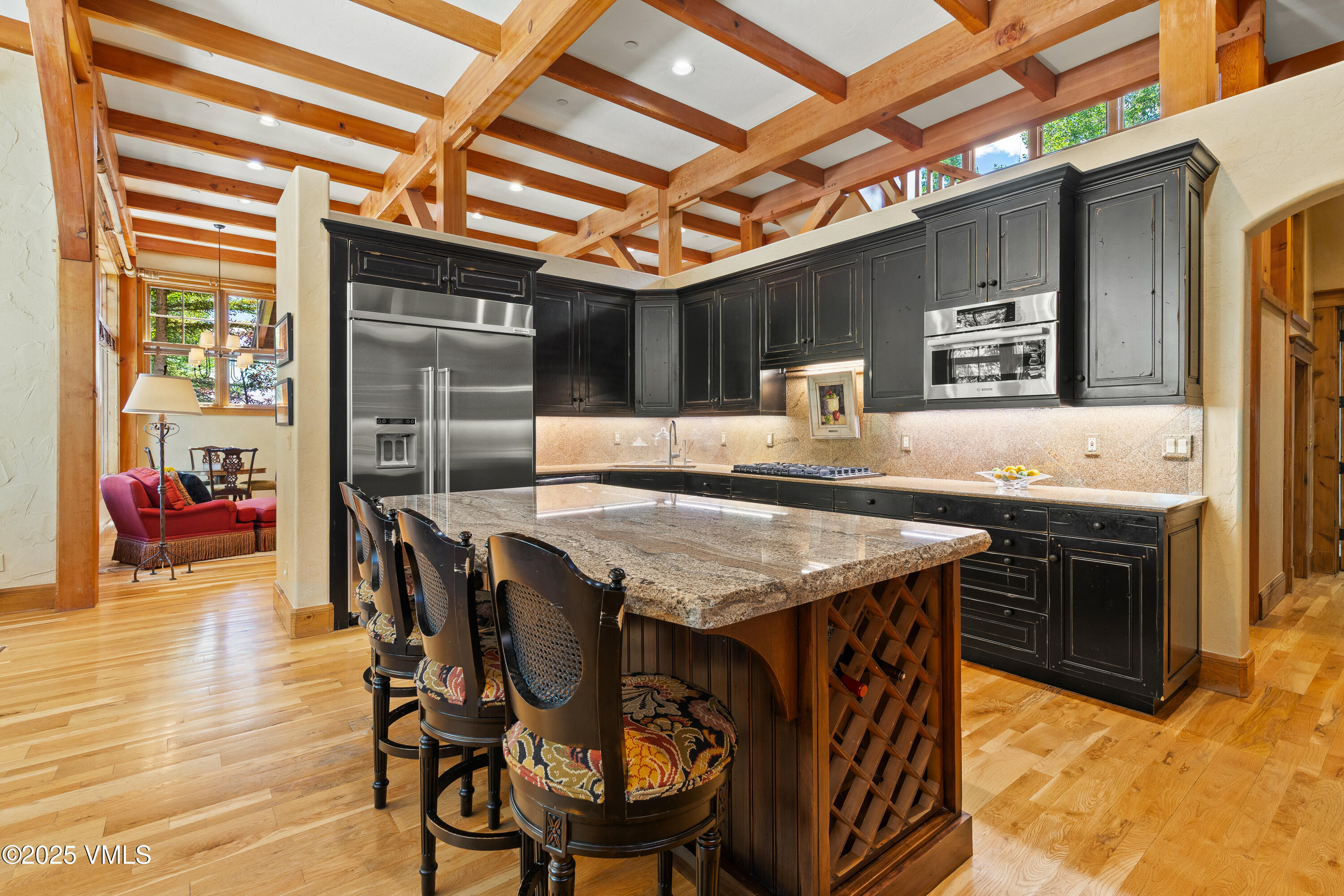 33 Grey Hawk Lane Edwards, CO 81632 - Photo 16 of 78 a dining table with chairs and wooden floor
