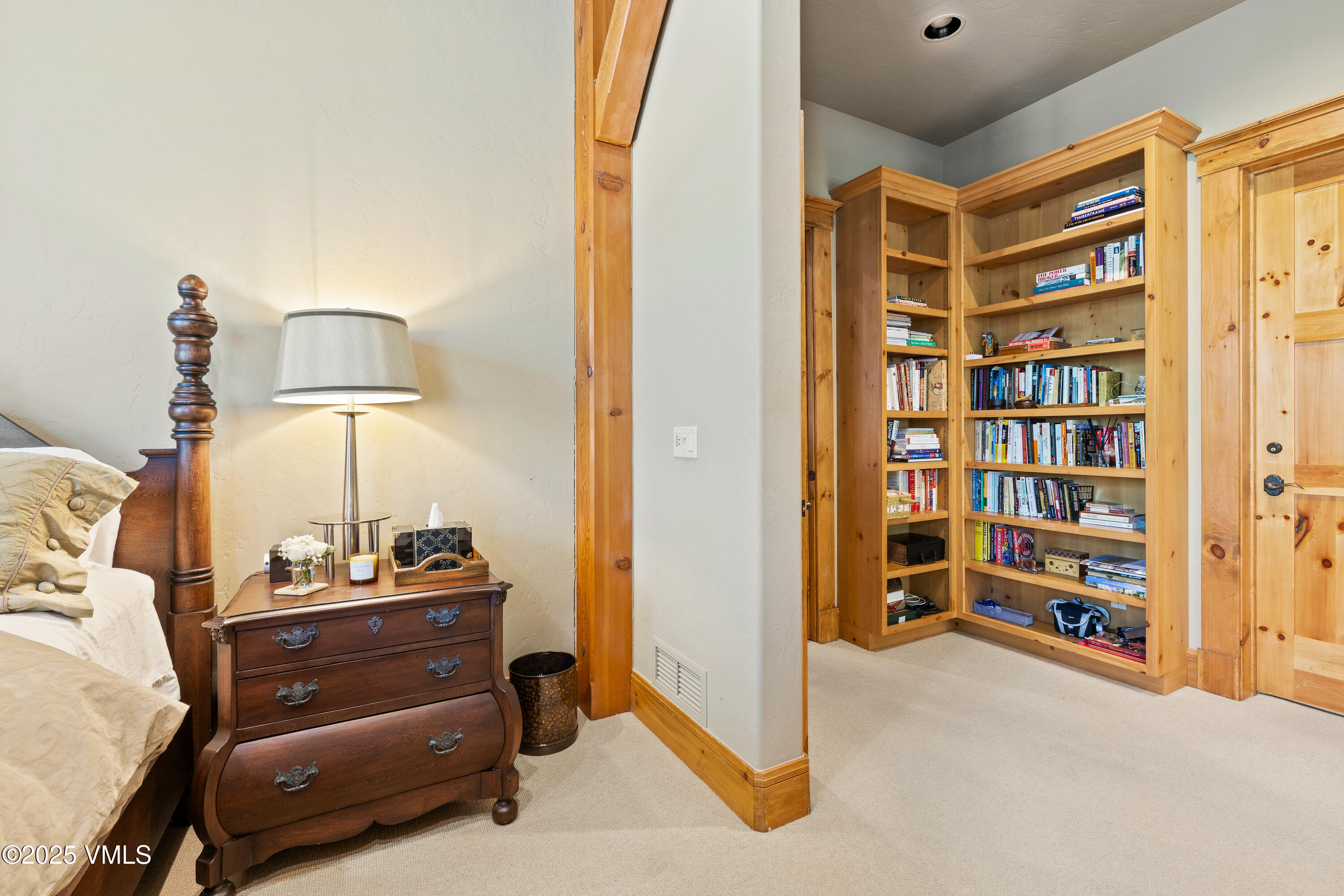 33 Grey Hawk Lane Edwards, CO 81632 - Photo 24 of 78 a room with a bed and a book shelf