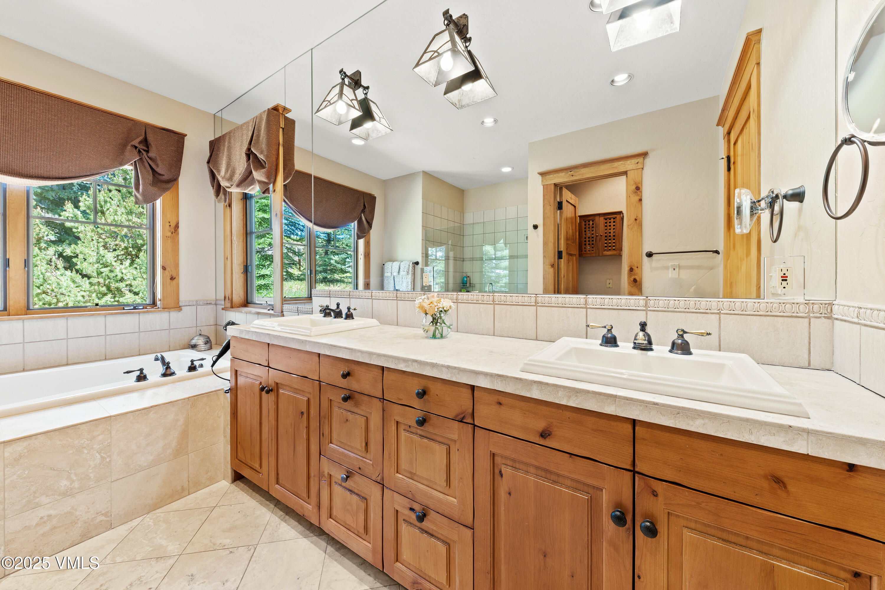 33 Grey Hawk Lane Edwards, CO 81632 - Photo 26 of 78 a spacious bathroom with a double vanity sink mirror and double