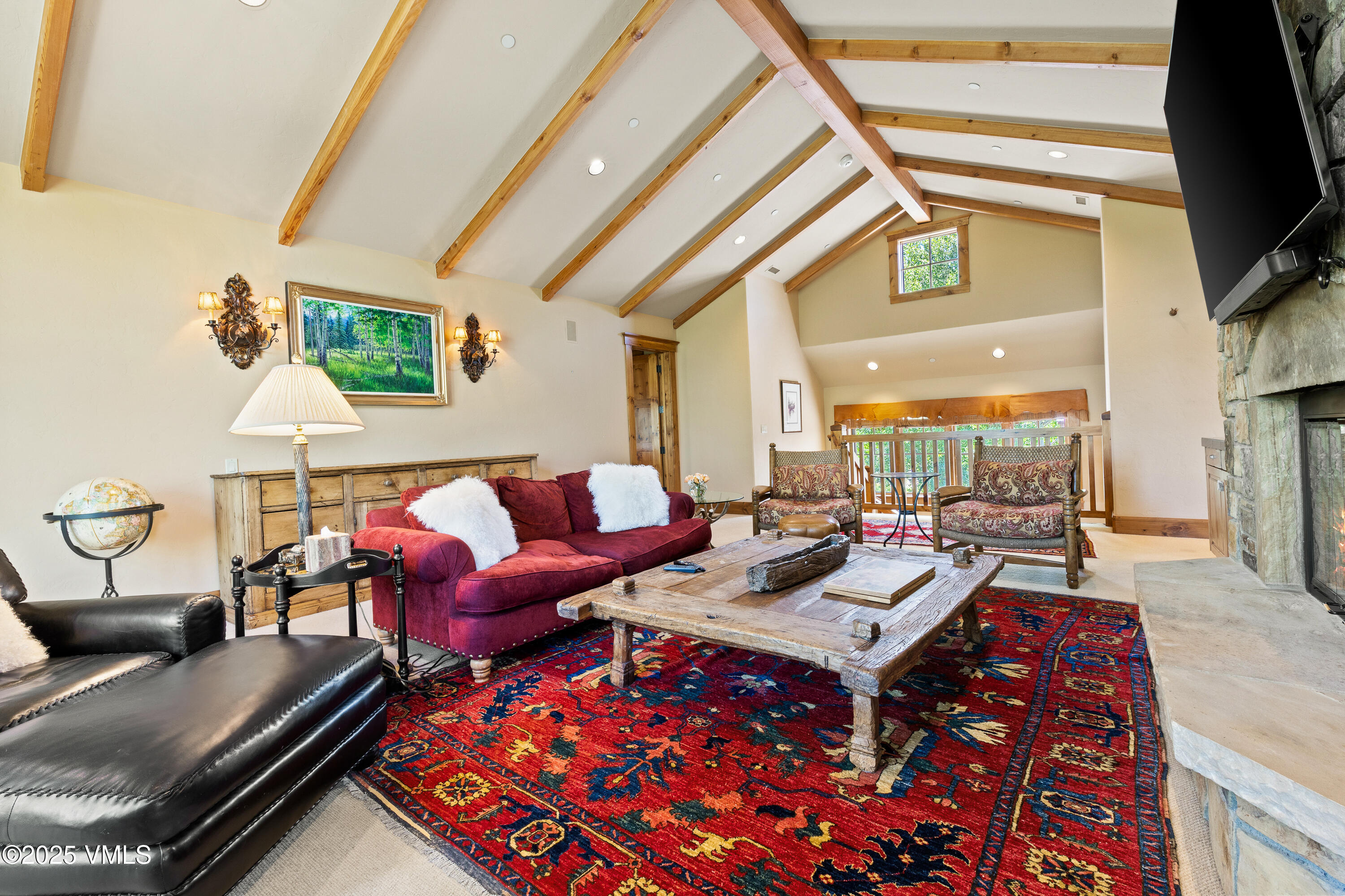 33 Grey Hawk Lane Edwards, CO 81632 - Photo 32 of 78 a living room with furniture and a flat screen tv