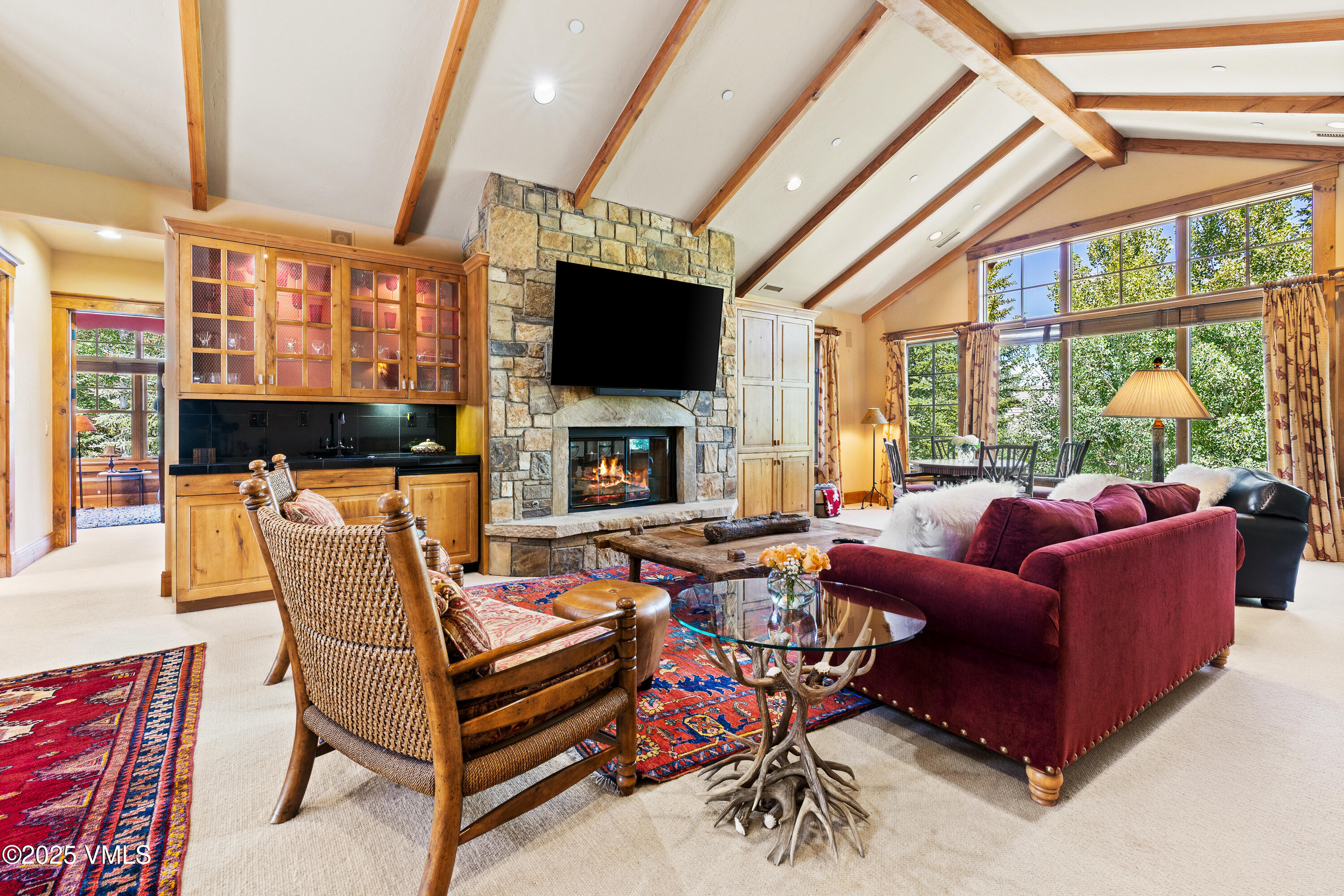33 Grey Hawk Lane Edwards, CO 81632 - Photo 33 of 78 a living room with fireplace furniture and a flat screen tv
