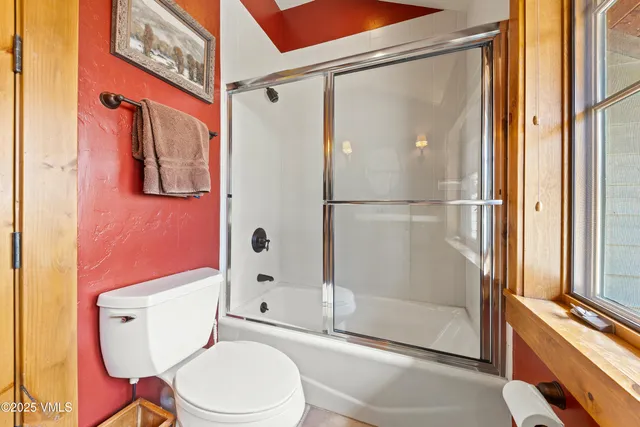 a view of a park with swings and slides