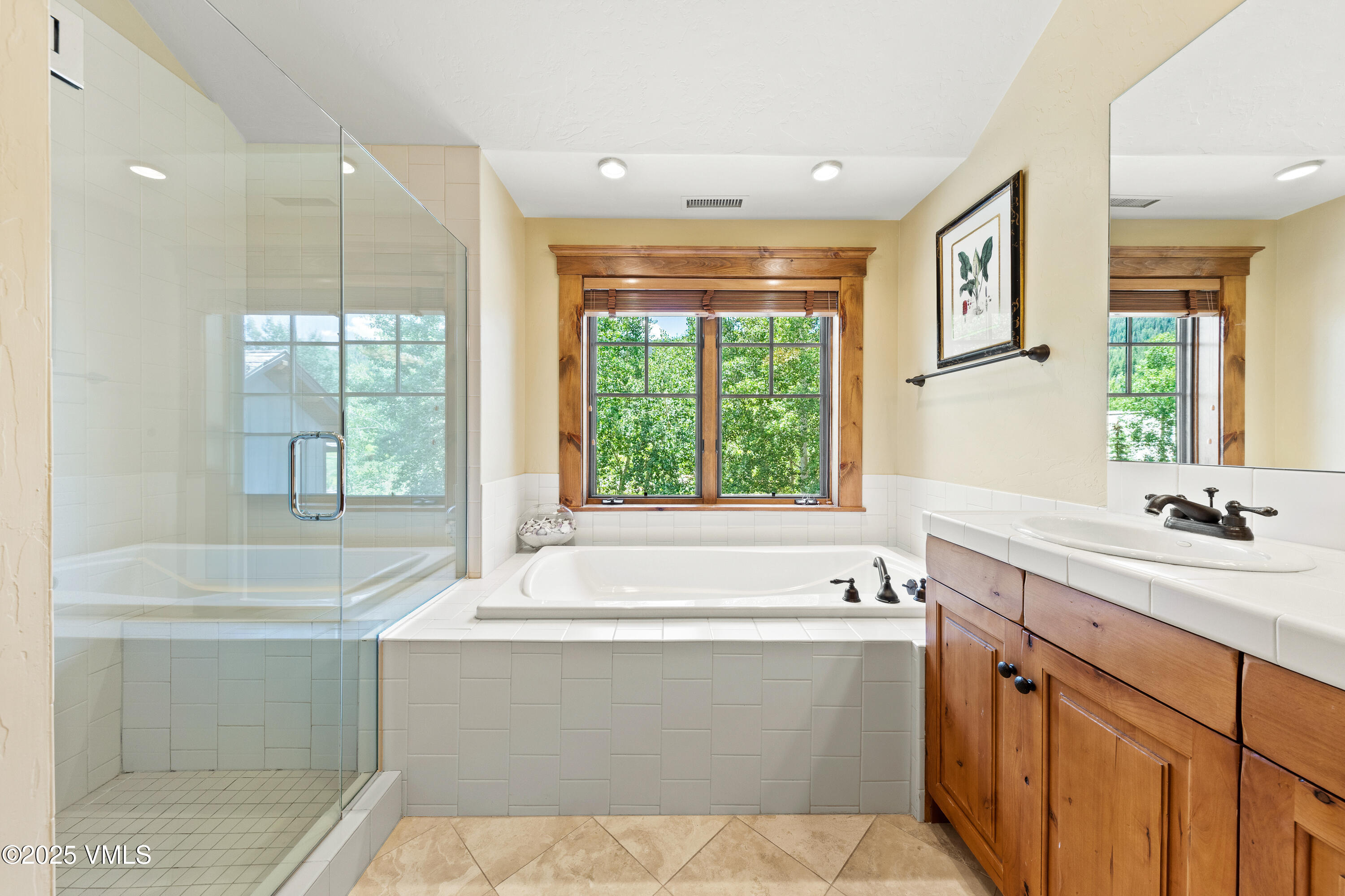 33 Grey Hawk Lane Edwards, CO 81632 - Photo 46 of 78 a bathroom with a bathtub a sink and a window