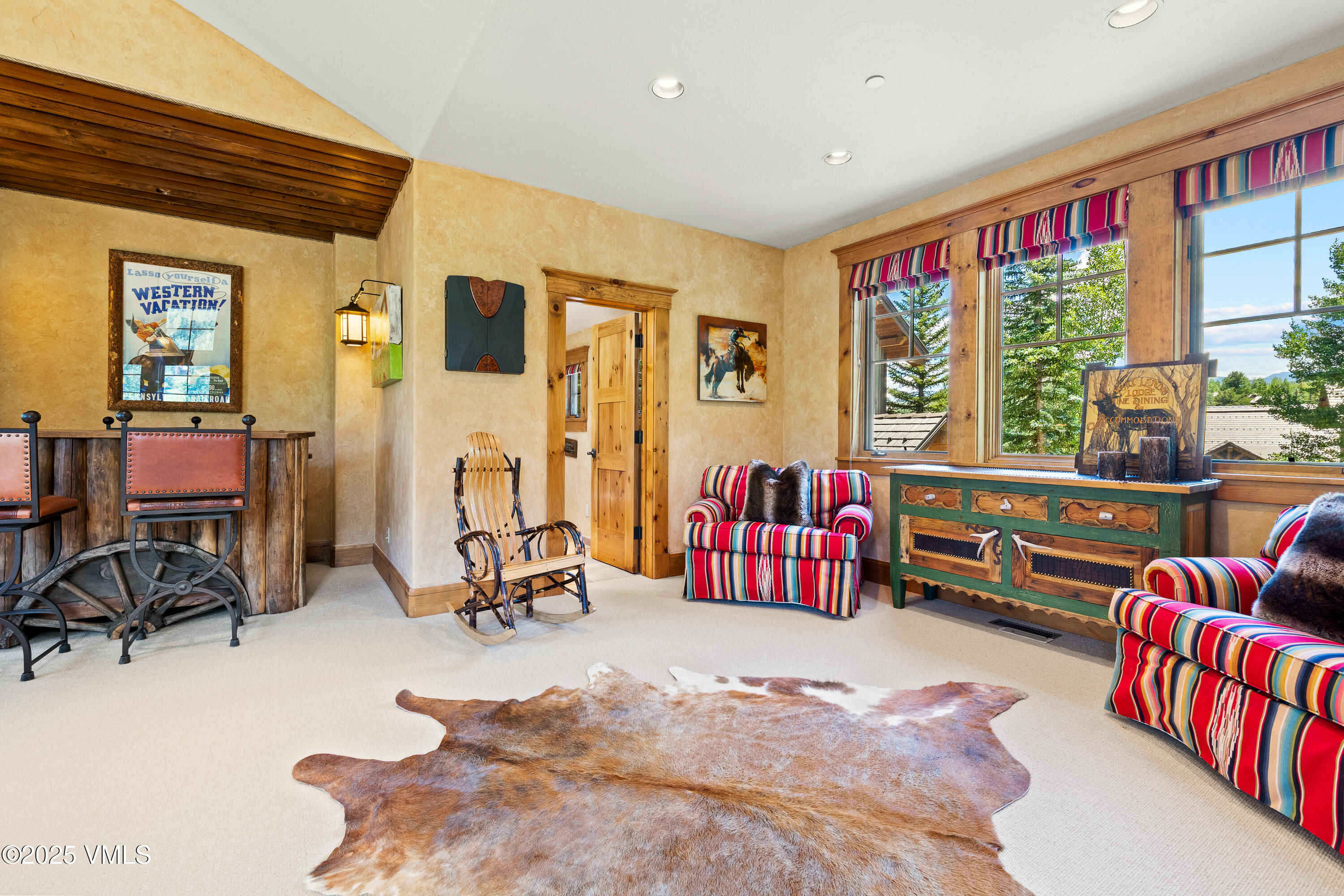 33 Grey Hawk Lane Edwards, CO 81632 - Photo 50 of 78 a living room with furniture and floor to ceiling windows
