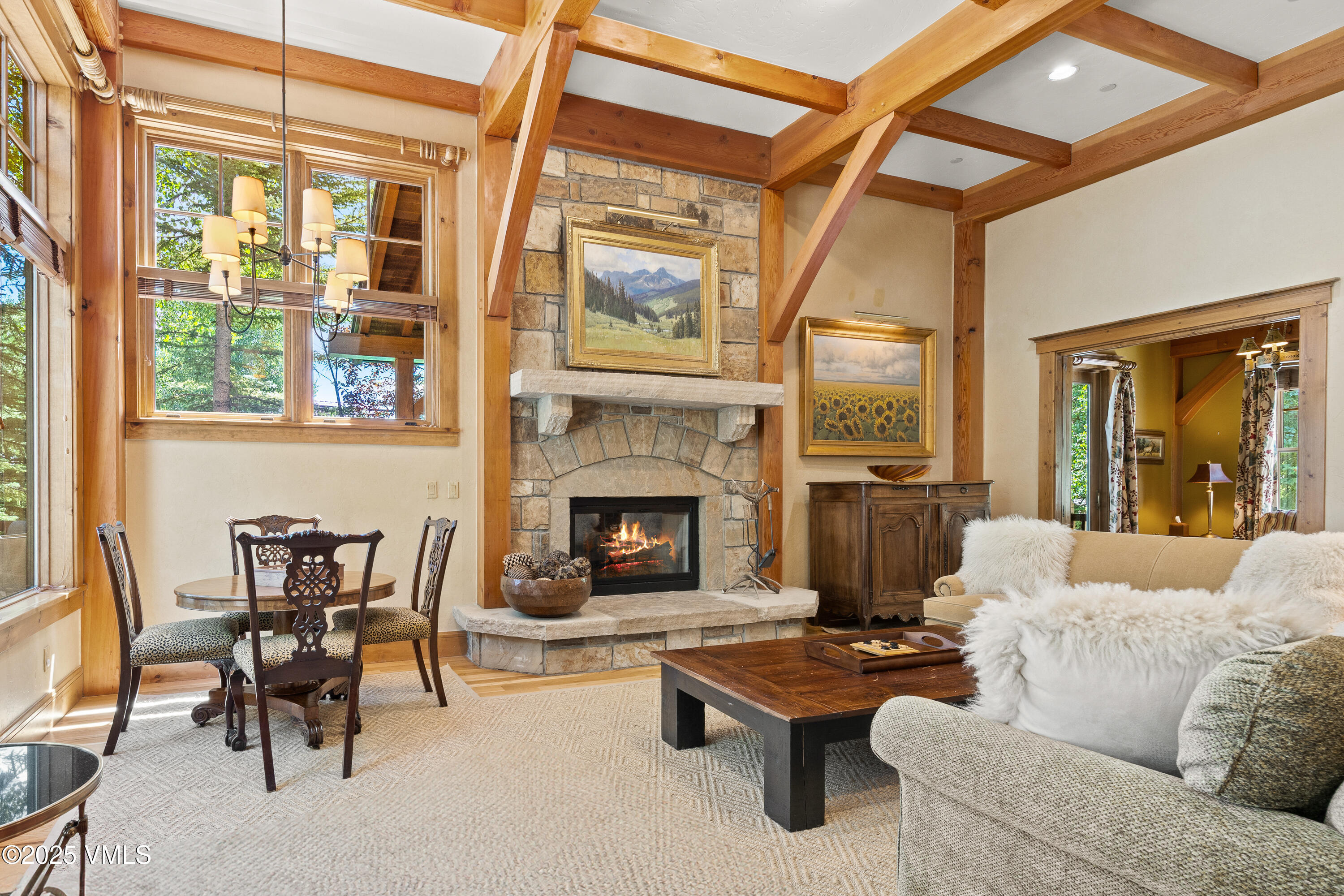 33 Grey Hawk Lane Edwards, CO 81632 - Photo 5 of 78 a living room with furniture fireplace and a large window