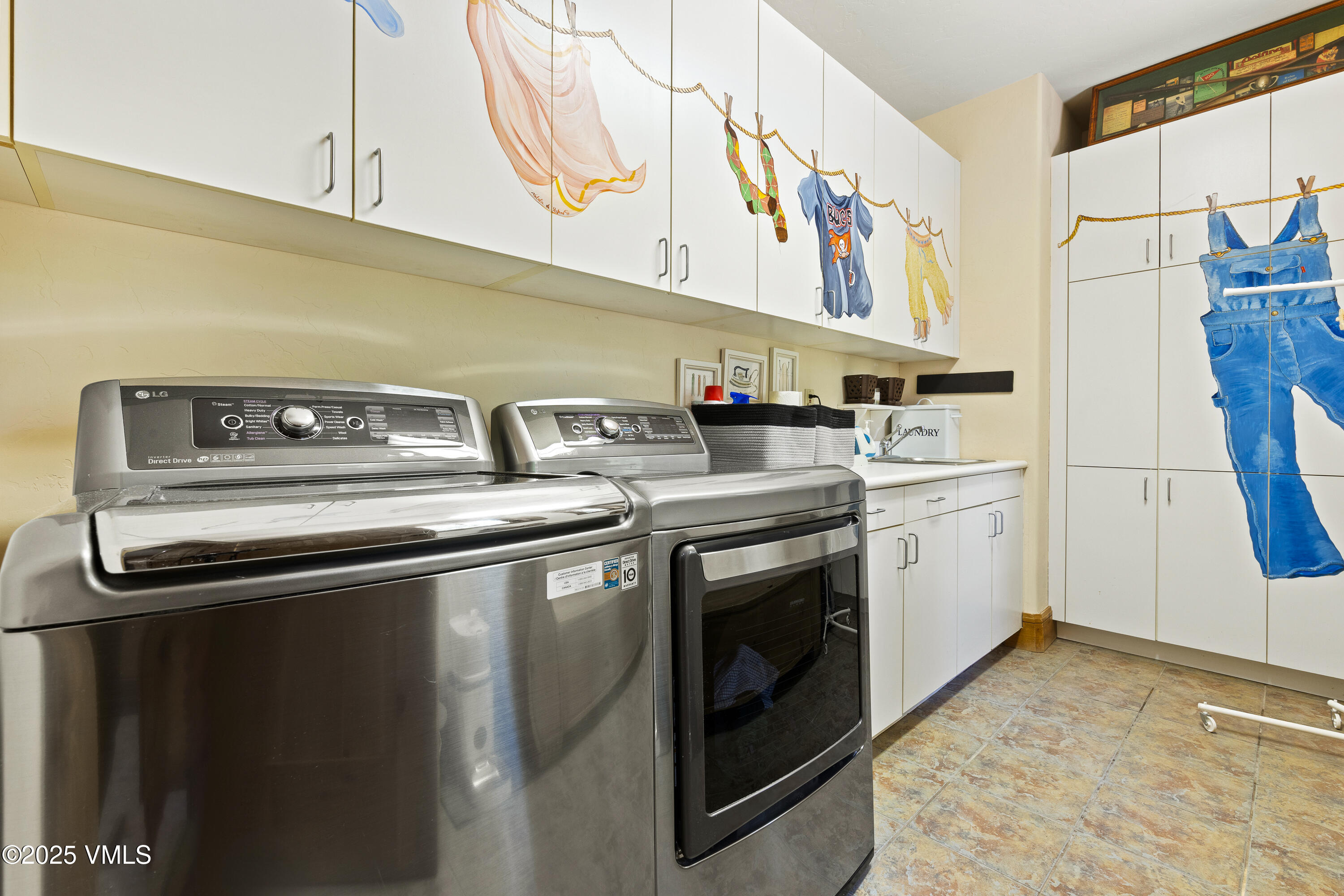 33 Grey Hawk Lane Edwards, CO 81632 - Photo 54 of 78 a utility room with stainless steel appliances and white cabinets