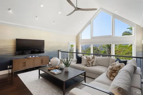 a view of a backyard with swimming pool and furniture