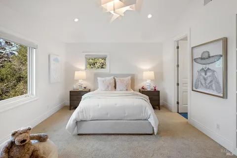 a view of a storage & utility room with washer and dryer