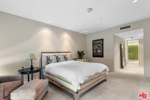 a bathroom with a double vanity sink and mirror