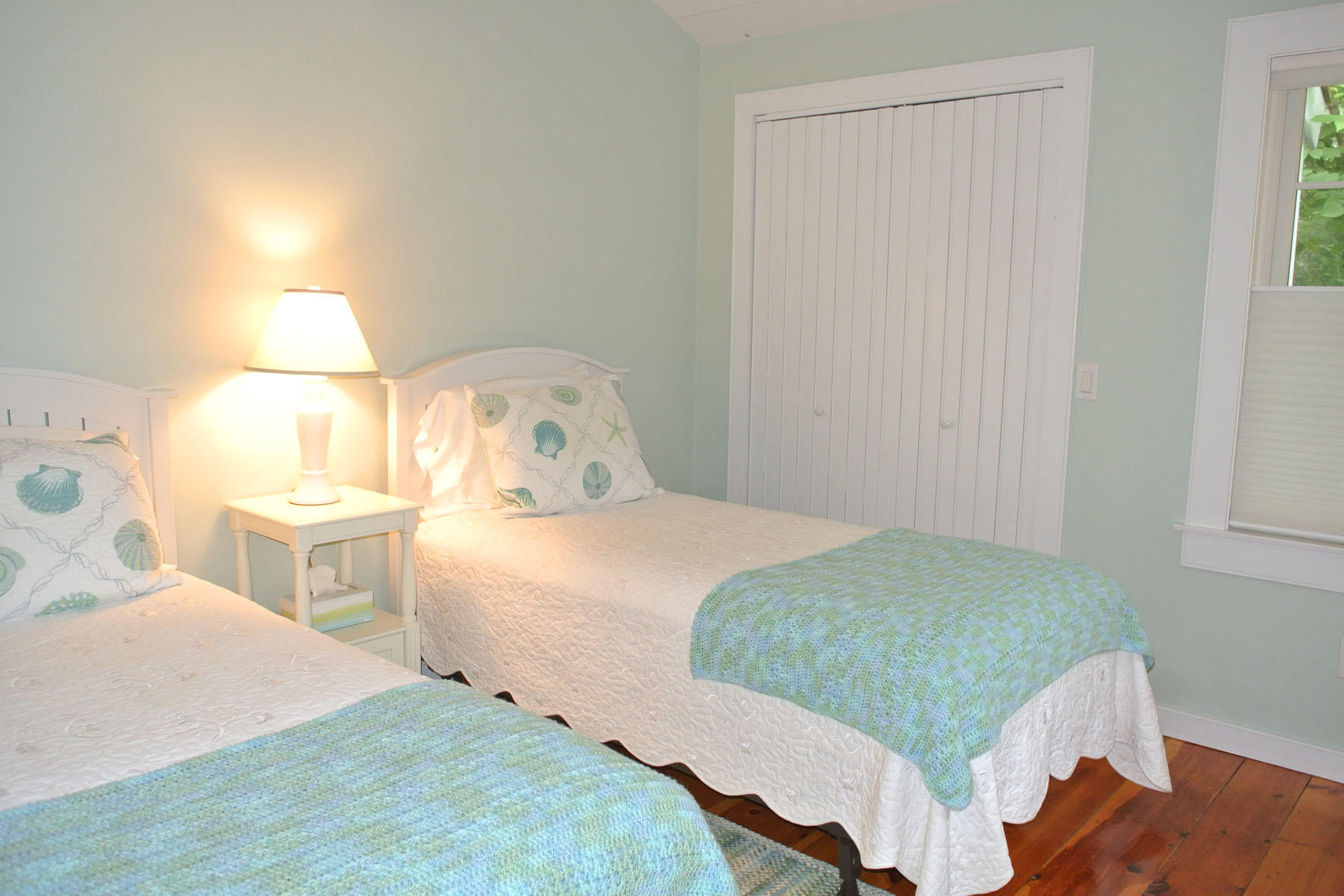 34 Brant Rock Road Mashpee, MA 02649 - Photo 7 of 15 a bedroom with a bed and a window