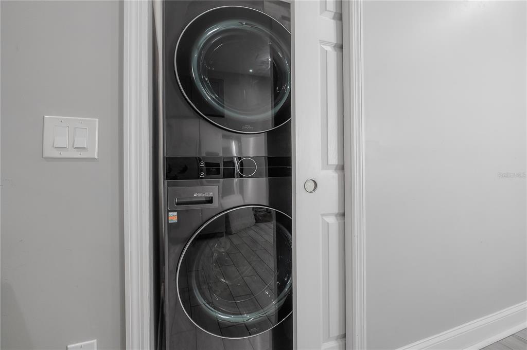 2341 West Chestnut Street Tampa, FL 33607 - Photo 34 of 42 a close view of a utility room with dryer and washer