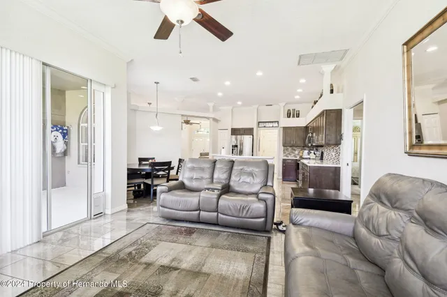 a large bathroom with a granite countertop sink and a large mirror